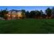 Expansive lawn area in backyard with exterior view, showcasing a lovely outdoor space at 3970 White Bay Dr, Highlands Ranch, CO 80126
