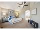 Serene main bedroom with vaulted ceiling and an en-suite bathroom with soaking tub at 3970 White Bay Dr, Highlands Ranch, CO 80126