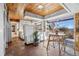 Eat-in kitchen with beautiful terracotta floors, wood ceilings, and views at 8258 W 66Th Dr, Arvada, CO 80004