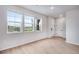 Bright and airy living room with hardwood floors and plenty of natural light at 16774 W 93Rd Pl, Arvada, CO 80007