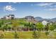 Community playground with green space for outdoor enjoyment and activities in a Gathering-friendly neighborhood at 16774 W 93Rd Pl, Arvada, CO 80007