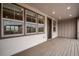 This charming outdoor living space is perfect for relaxation with recessed lights and views of surrounding neighborhood at 16774 W 93Rd Pl, Arvada, CO 80007