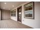 Charming outdoor living space offering recessed lighting and views of the community and well-manicured landscapes at 16774 W 93Rd Pl, Arvada, CO 80007
