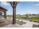 Inviting outdoor space with views of the well-maintained landscaping and sidewalks of this delightful community at 16774 W 93Rd Pl, Arvada, CO 80007