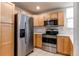 Modern kitchen with stainless steel appliances at 1727 N Pearl St # 201, Denver, CO 80203