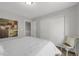 Bedroom with sliding door closet and modern decor at 17052 Lipan St, Broomfield, CO 80023