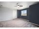 Carpeted bedroom features a window and closet with white doors at 17052 Lipan St, Broomfield, CO 80023