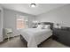 Cozy bedroom with natural light, neutral colors and furnishings at 17052 Lipan St, Broomfield, CO 80023