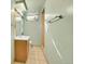 Clean basement bathroom, includes a vanity, toilet and shower at 12152 E Dakota Ave, Aurora, CO 80012