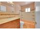 Bathroom with vanity, bathtub and tile surround at 12152 E Dakota Ave, Aurora, CO 80012