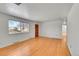 Hardwood floor living room with large window at 12152 E Dakota Ave, Aurora, CO 80012