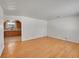 Living room with hardwood floors and kitchen view at 12152 E Dakota Ave, Aurora, CO 80012