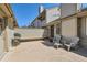 Back patio featuring outdoor seating, a grill, and a well-kept concrete patio at 9925 W Progress Pl, Littleton, CO 80123