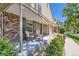 Inviting front porch with seating, perfect for relaxing and enjoying the outdoors at 9925 W Progress Pl, Littleton, CO 80123