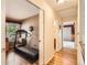 Hallway featuring a treadmill room with an exercise machine at 9925 W Progress Pl, Littleton, CO 80123