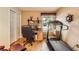 An office area featuring an exercise machine at 9925 W Progress Pl, Littleton, CO 80123