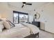 Relaxing bedroom with a city view, comfortable bed, and stylish decor at 1750 Wewatta St # 704, Denver, CO 80202