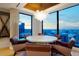 Inviting dining area with modern lighting and a view of the cityscape at 1750 Wewatta St # 704, Denver, CO 80202