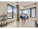 Elegant dining area featuring a modern table with city views, perfect for entertaining at 1750 Wewatta St # 704, Denver, CO 80202