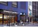 Street-level view of commercial building featuring a Sweetgreen restaurant with outdoor seating at 1750 Wewatta St # 704, Denver, CO 80202