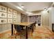 Cozy library filled with bookshelves and a large table at 1750 Wewatta St # 704, Denver, CO 80202