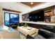 Bright living room with a large TV and modern furnishings at 1750 Wewatta St # 704, Denver, CO 80202