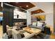 Contemporary living room with fireplace, artwork, and comfortable seating at 1750 Wewatta St # 704, Denver, CO 80202