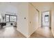 Inviting living room with hardwood floors, large windows with a city view, and modern decor at 1750 Wewatta St # 704, Denver, CO 80202