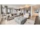 Cozy living room featuring modern decor, plush seating, and ample natural light at 1750 Wewatta St # 704, Denver, CO 80202