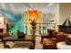 Beautifully decorated lobby with cozy seating and an artistic design feature on the wall at 1750 Wewatta St # 704, Denver, CO 80202