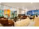Comfortable lounge area featuring leather furniture and stylish decor at 1750 Wewatta St # 704, Denver, CO 80202