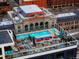 Stunning rooftop pool with lounge seating and views of the city's iconic Union Station at 1750 Wewatta St # 704, Denver, CO 80202