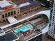 Aerial view of the building's rooftop pool overlooking Union Station at 1750 Wewatta St # 704, Denver, CO 80202