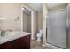 Bathroom featuring a shower, sink, and toilet at 1014 Ponderosa Cir, Longmont, CO 80504