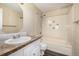 Bathroom featuring tub, shower, and vanity at 1014 Ponderosa Cir, Longmont, CO 80504
