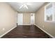 Bedroom with wood floors and ceiling fan at 1014 Ponderosa Cir, Longmont, CO 80504