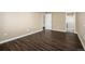 Bedroom with wood floors and en suite bathroom at 1014 Ponderosa Cir, Longmont, CO 80504