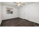 Bedroom featuring wood flooring and white walls at 1014 Ponderosa Cir, Longmont, CO 80504