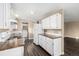 A clean and modern kitchen with plenty of counter space and modern appliances at 1014 Ponderosa Cir, Longmont, CO 80504