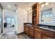 Spa-like bathroom with a soaking tub, glass shower, and view to bedroom at 55 N Pines Trl, Parker, CO 80138