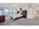 Main bedroom with a built-in dresser and access to a private balcony at 55 N Pines Trl, Parker, CO 80138