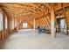 Unfinished attic space showing exposed wooden beams and rafters, ready for customization at 10151 E 138Th Pl, Brighton, CO 80602