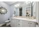 Bathroom featuring double vanity, modern fixtures, and sleek design, offering comfort and style at 10151 E 138Th Pl, Brighton, CO 80602