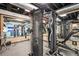 Home gym featuring a full weight set and training equipment, set in a naturally lit space at 10151 E 138Th Pl, Brighton, CO 80602