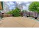 Expansive backyard patio surrounded by a wooden fence, providing privacy and space for outdoor activities at 3000 Alkire St, Golden, CO 80401