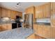 Spacious kitchen with granite countertops, stainless steel appliances, and ample cabinet space at 3000 Alkire St, Golden, CO 80401
