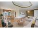 Bright, virtually staged living room with wood floors, stylish decor, and a comfortable seating area at 3000 Alkire St, Golden, CO 80401