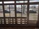 Enclosed sunroom with large windows offers a bright and airy space at 680 S Alton Way # 9A, Denver, CO 80247
