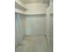Spacious walk-in closet with ample storage, shelving and neutral walls at 680 S Alton Way # 9A, Denver, CO 80247