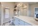 Double vanity bathroom with a large mirror and plenty of counter space at 9490 W 14Th Ave # 3, Lakewood, CO 80215